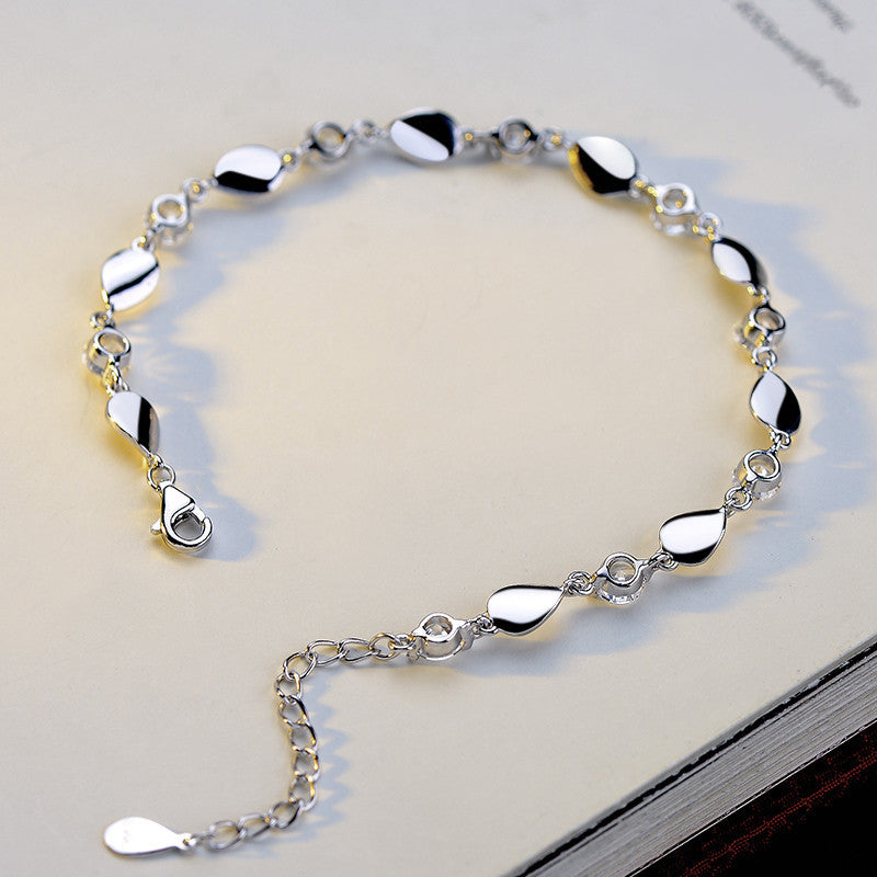 Diamond-encrusted silver bracelet