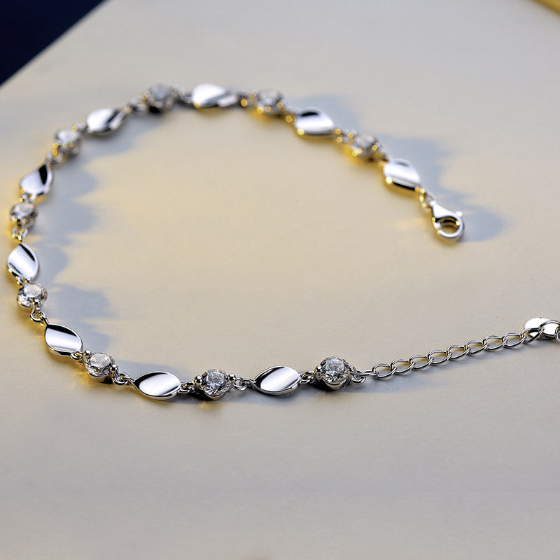 Diamond-encrusted silver bracelet