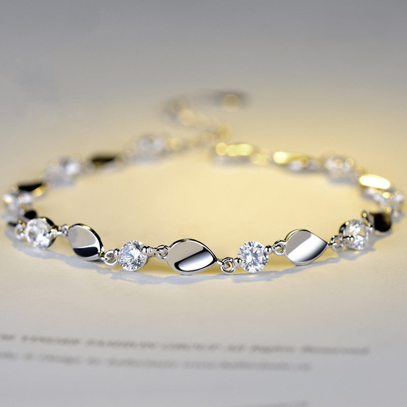 Diamond-encrusted silver bracelet