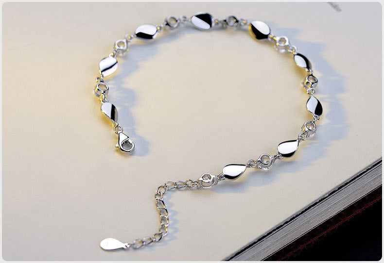 Diamond-encrusted silver bracelet