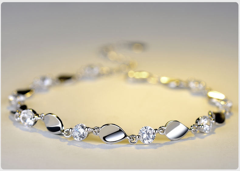 Diamond-encrusted silver bracelet